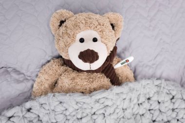 teddy bear with thermometer clipart
