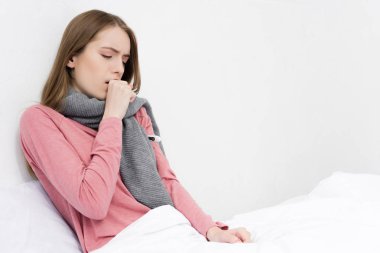 Sick girl having cough clipart