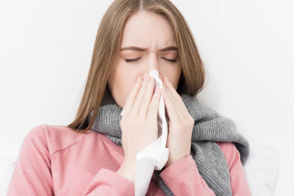 Sick girl wiping nose — Stock Photo, Image