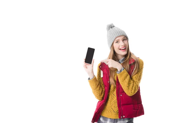 Girl pointing at smartphone — Stock Photo, Image