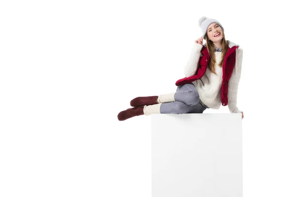 Sitting girl in knitted hat — Stock Photo, Image