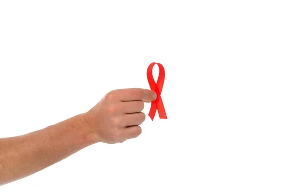 Man holding aids ribbon — Free Stock Photo