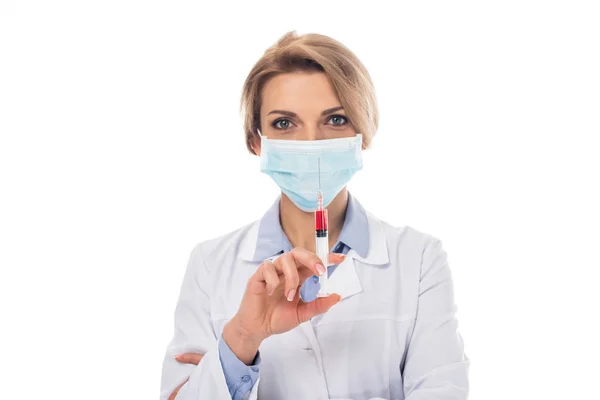 Doctor with syringe of blood — Stock Photo, Image