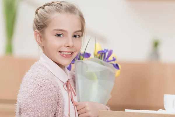 Smiling Kid Holding Bouquet Flowers Hands Looking Camera — Stock Photo, Image