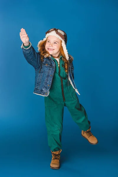 Happy Adorable Preteen Kid Pilot Costume Gesturing Isolated Blue — Stock Photo, Image