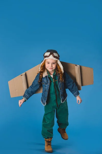 Adorable Preteen Kid Pilot Costume Paper Plane Wings Isolated Blue — Stock Photo, Image