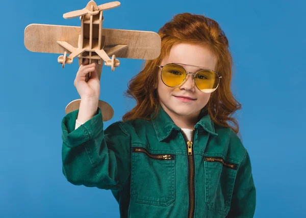 Portrait Smiling Child Pilot Costume Wooden Plane Toy Isolated Blue — Stock Photo, Image