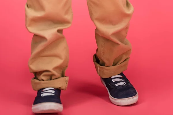 stock image cropped shot of kid in casual clothing isolated on pink