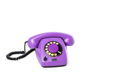 close-up view of purple rotary telephone isolated on white 