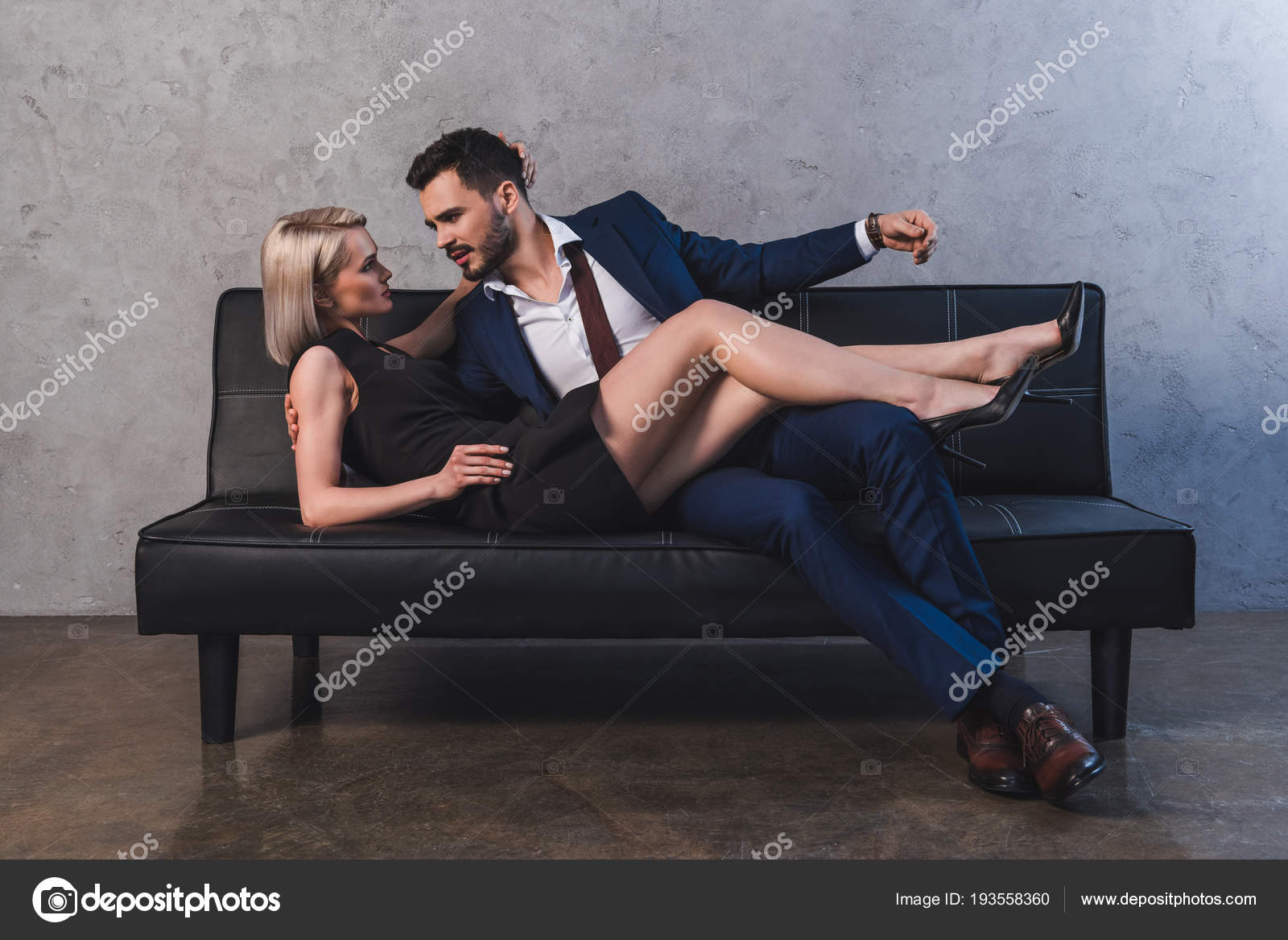 Seductive Young Couple Hugging Looking Each Other Foreplay Sofa Stock Photo  by ©AndrewLozovyi 193558360