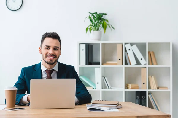 Handsome Smiling Young Businessman Using Laptop Workplace — Stock Photo, Image