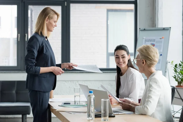 Side View Beautiful Businesswoman Giving Documents Colleague Meeting Office — Stock Photo, Image