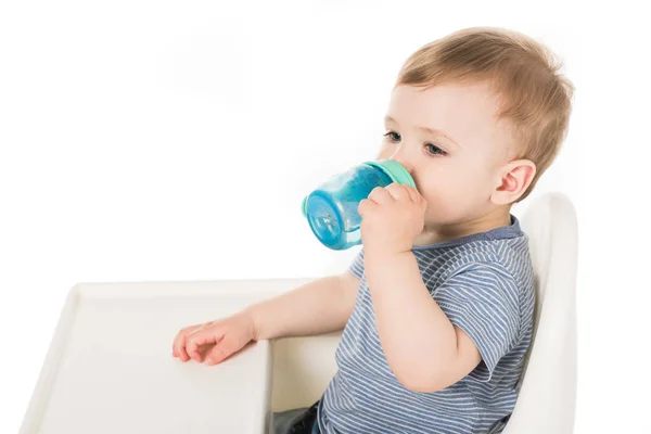 Little Boy Drinking Water Baby Cup Sitting Highchair Isolated White — Stock Photo, Image