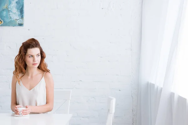 Thoughtful Young Woman Cup Coffee Front White Brick Wall Looking — Stock Photo, Image