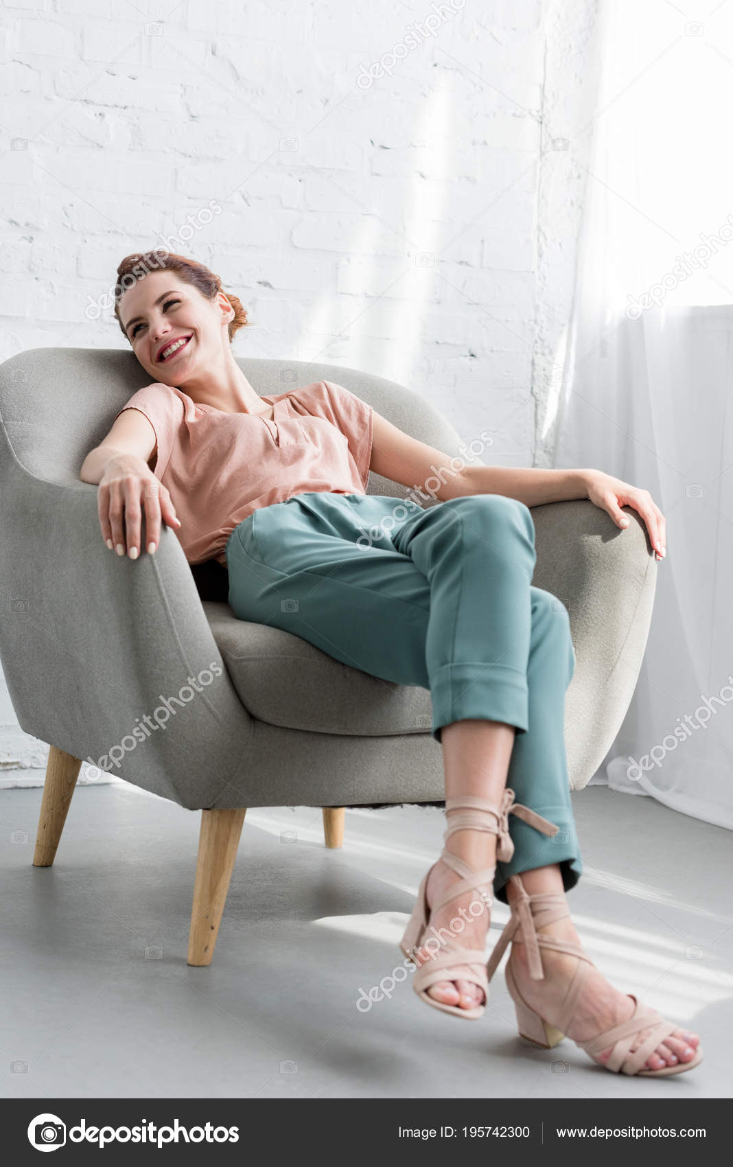 Happy Young Woman Relaxing Armchair Home Stock Photo