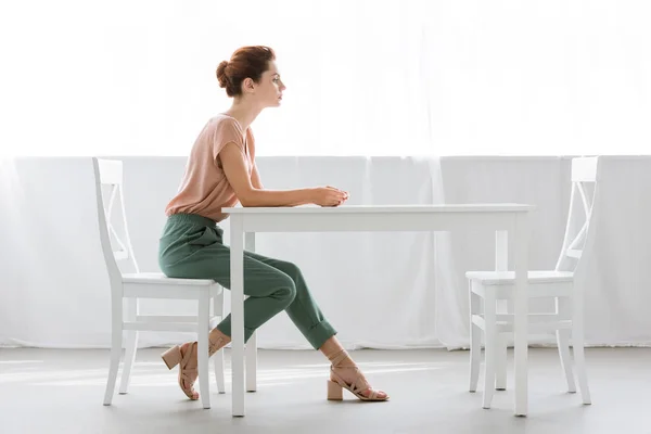 Side View Attractive Young Woman Sitting Table Alone Home — Stock Photo, Image