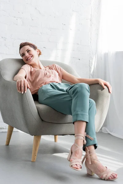 Happy Young Woman Relaxing Armchair Home — Stock Photo, Image