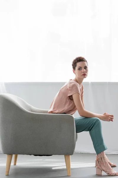 Side View Attractive Young Woman Sitting Armchair Home — Stock Photo, Image