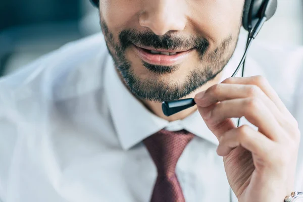 Partial View Smiling Call Center Operator Using Headset — Stock Photo, Image