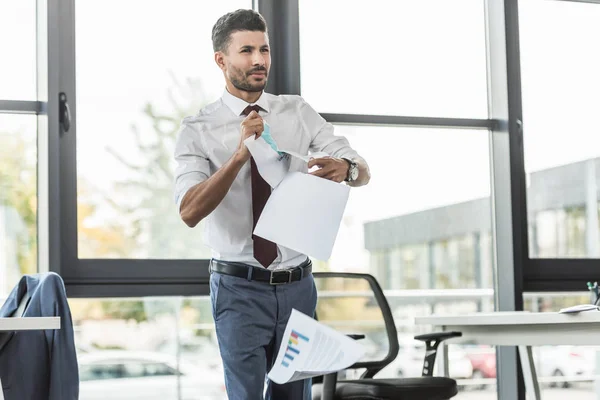 Displeased Businessman Tearing Documents Looking Away While Standing Window Office — Stock Photo, Image