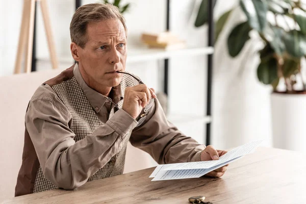 Pensive Retired Man Holding Glasses Papers — Stock Photo, Image