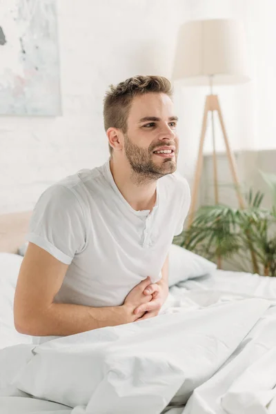 Young Man Sitting Bed Suffering Stomach Pain — Stock Photo, Image