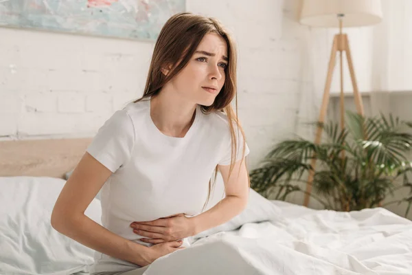 Upset Girl Touching Stomach While Suffering Abdominal Pain — Stock Photo, Image