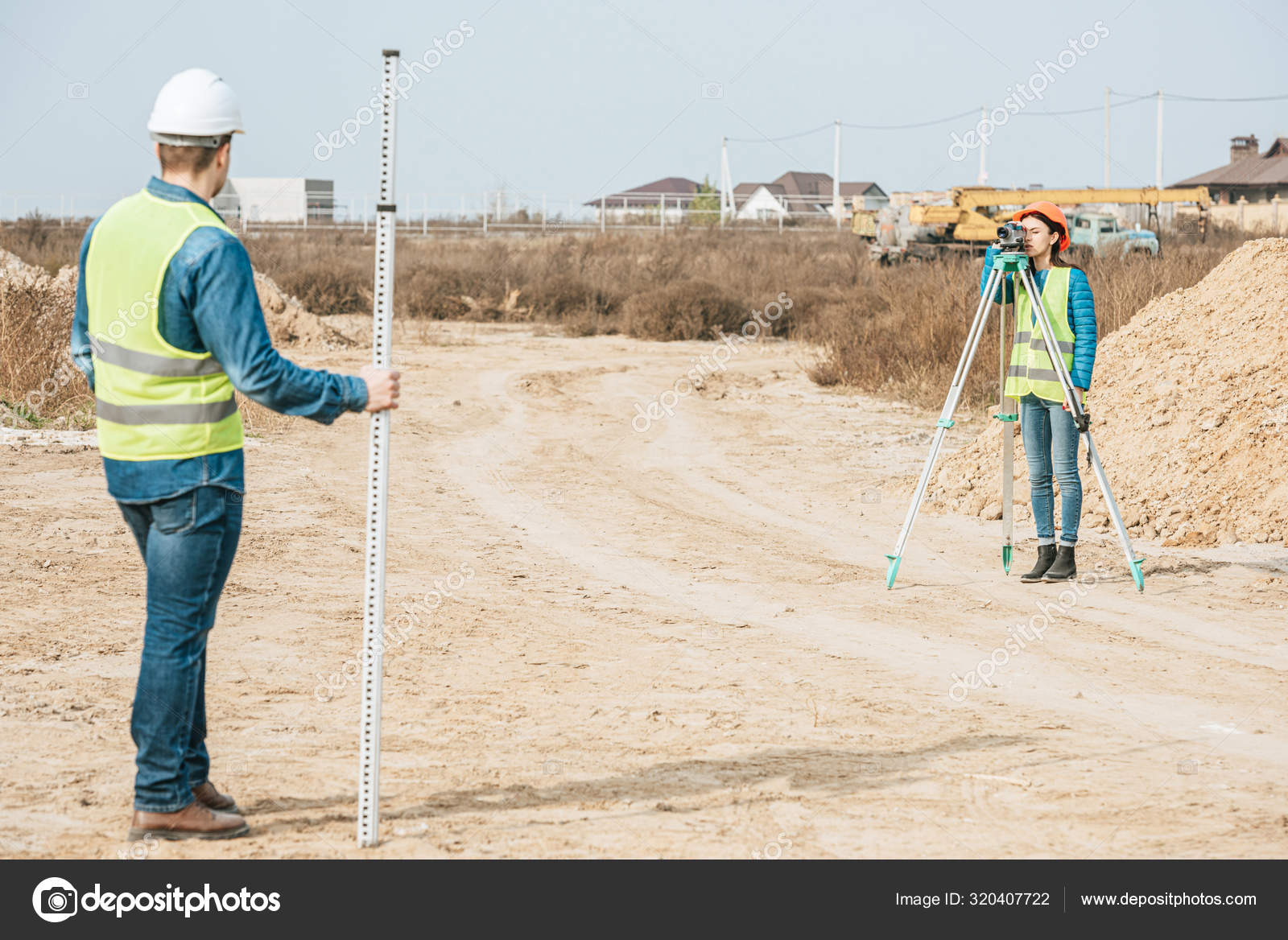 Surveyors Digital Level Survey Ruler Working Dirt Road — Stock