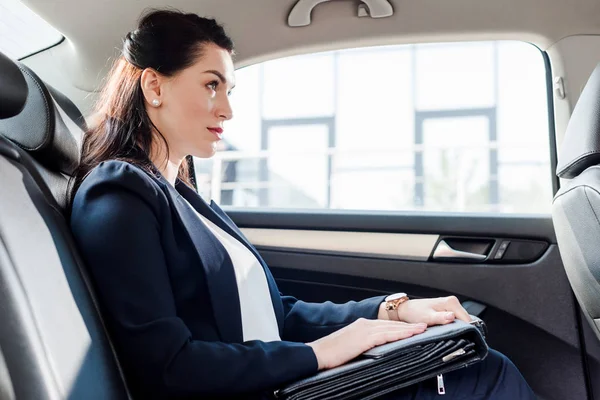 Side View Attractive Ambassador Holding Briefcase While Sitting Car — 스톡 사진