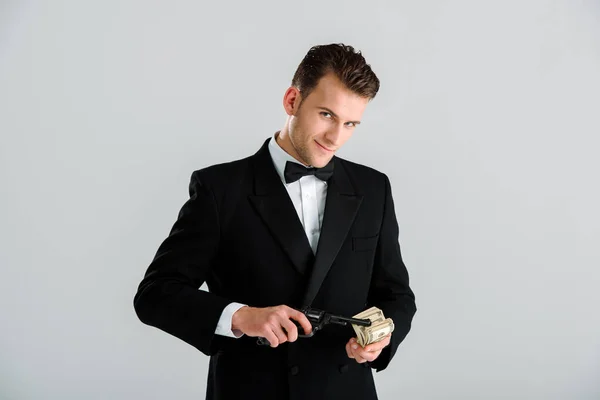 Happy Criminal Man Holding Gun Dollar Banknotes Isolated Grey — Stock Photo, Image