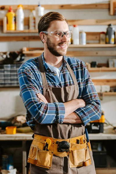 Cheerful Carpenter Goggles Standing Crossed Arms — Stock Photo, Image