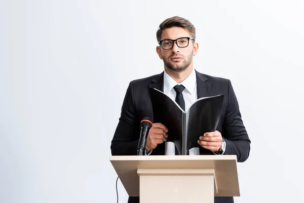 Businessman Suit Standing Podium Tribune Holding Folder Conference Isolated White — ストック写真