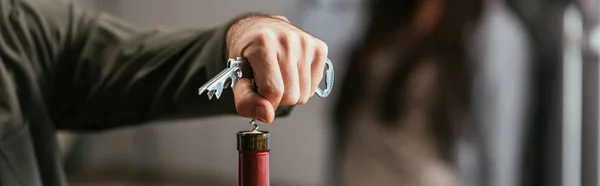 Selective Focus Man Opening Wine Bottle Worried Wife Background Panoramic — Stock Photo, Image