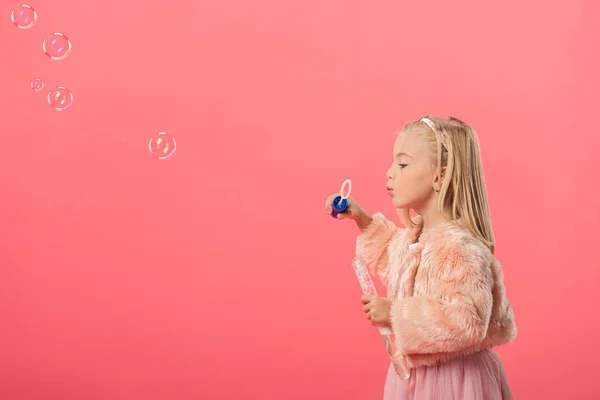 Side View Cute Kid Blowing Soap Bubbles Isolated Pink — Stock Photo, Image