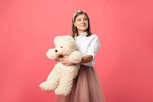 Attractive Smiling Woman Holding Teddy Bear Isolated Pink — ストック写真