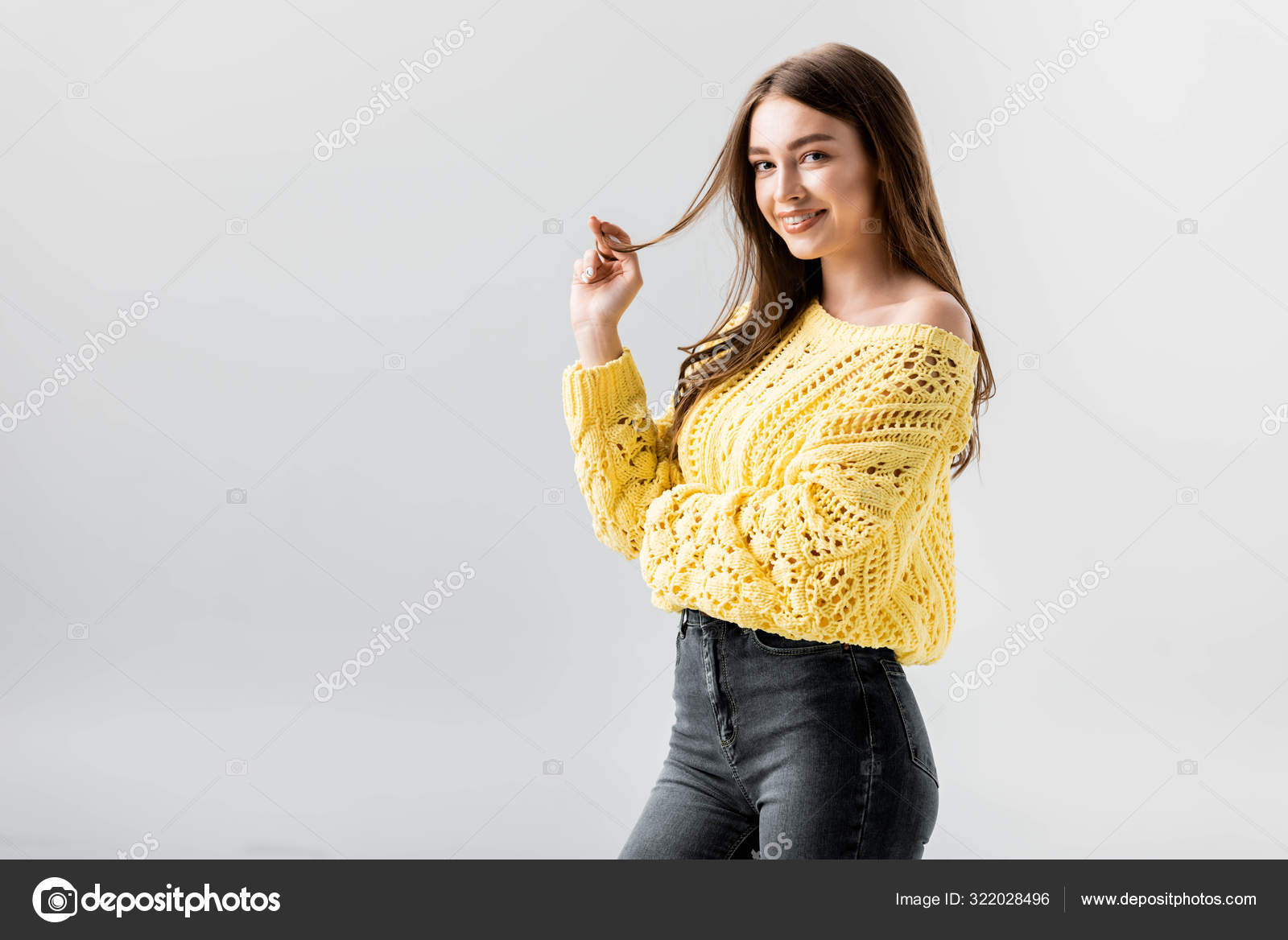 Attractive Flirty Girl Looking Camera While Touching Hair Isolated Grey  Stock Photo by ©AndrewLozovyi 322028496