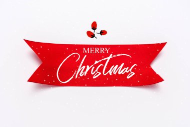 top view of red satin ribbon with merry christmas letters on white  clipart