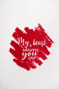 top view of red drawn stroke with my heart is wherever you are letters isolated on white  clipart