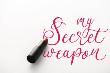 black tube with red lipstick near my secret weapon letters on white  clipart