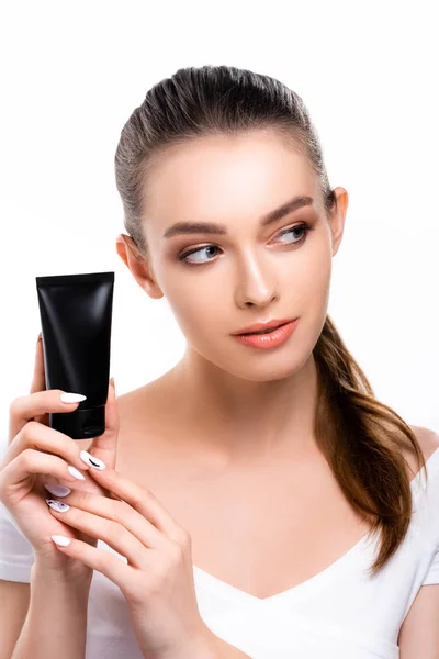 Beautiful Girl Looking Away While Holding Tube Hand Cream Isolated — Stock Photo, Image