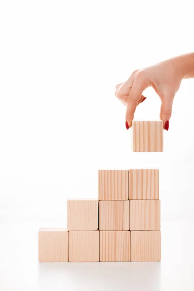 Cropped View Woman Putting Wooden Cube White — Stock Photo, Image
