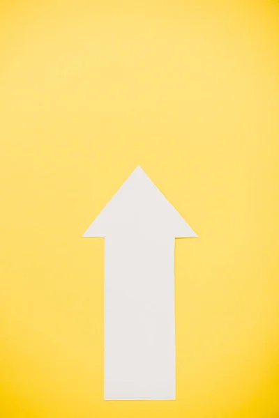 Top View White Arrow Isolated Yellow — Stock Photo, Image