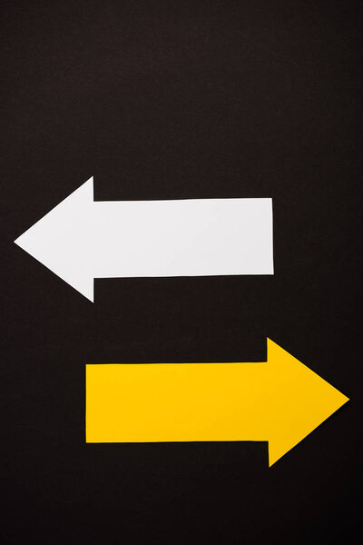 top view of directional arrows isolated on black 