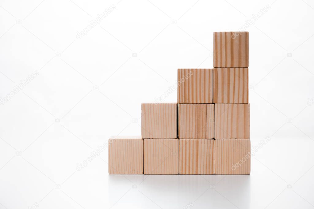 wooden cubes on white with copy space 