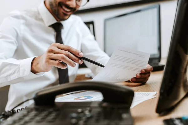 Cropped View Smiling Racial Trader Doing Paperwork Sitting Table — Stock Photo, Image