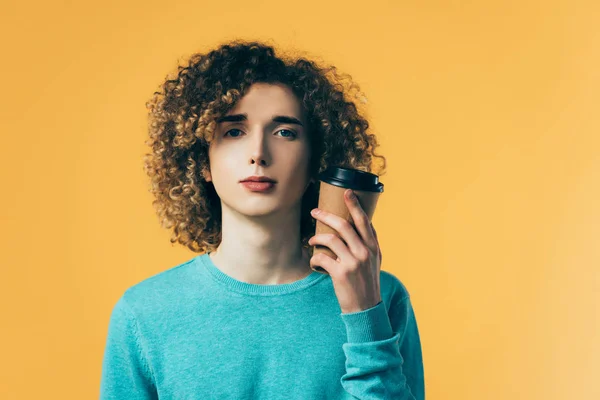 Curly Teenager Holding Coffee Paper Cup Isolated Yellow — Stock Photo, Image