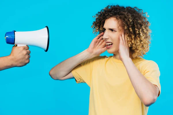 Cropped View Man Holding Loudspeaker Curly Teenager Covering Ears Isolated — Stock Photo, Image
