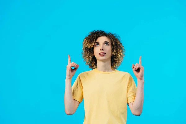Smiling Curly Teenager Pointing Fingers Isolated Blue — Stock Photo, Image