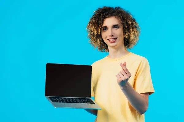 Smiling Curly Student Holding Laptop Blank Screen Showing Money Gesture — Stock Photo, Image