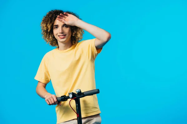 Happy Curly Teenager Riding Electric Scooter Isolated Blue — Stock Photo, Image